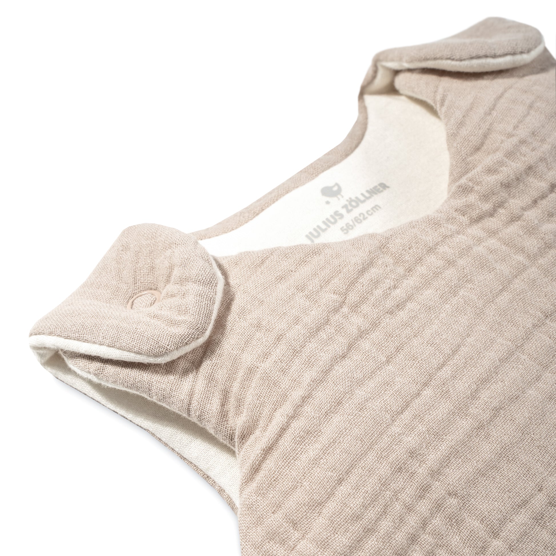 Atmungsaktiver Babyschlafsack in beige, ideal für komfortablen Schlaf und warme Nächte